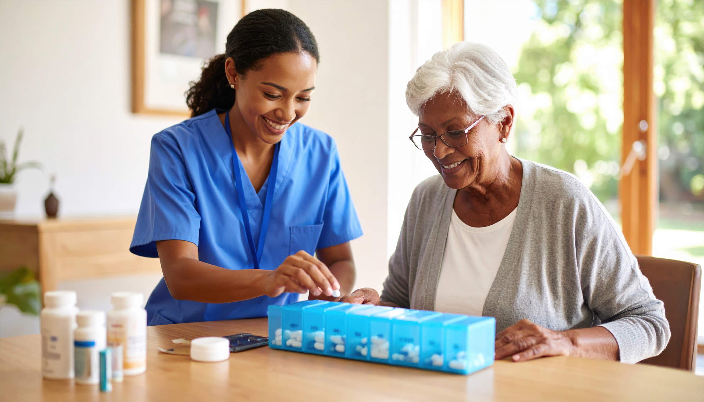 Caregiver helping elderly patient at home
